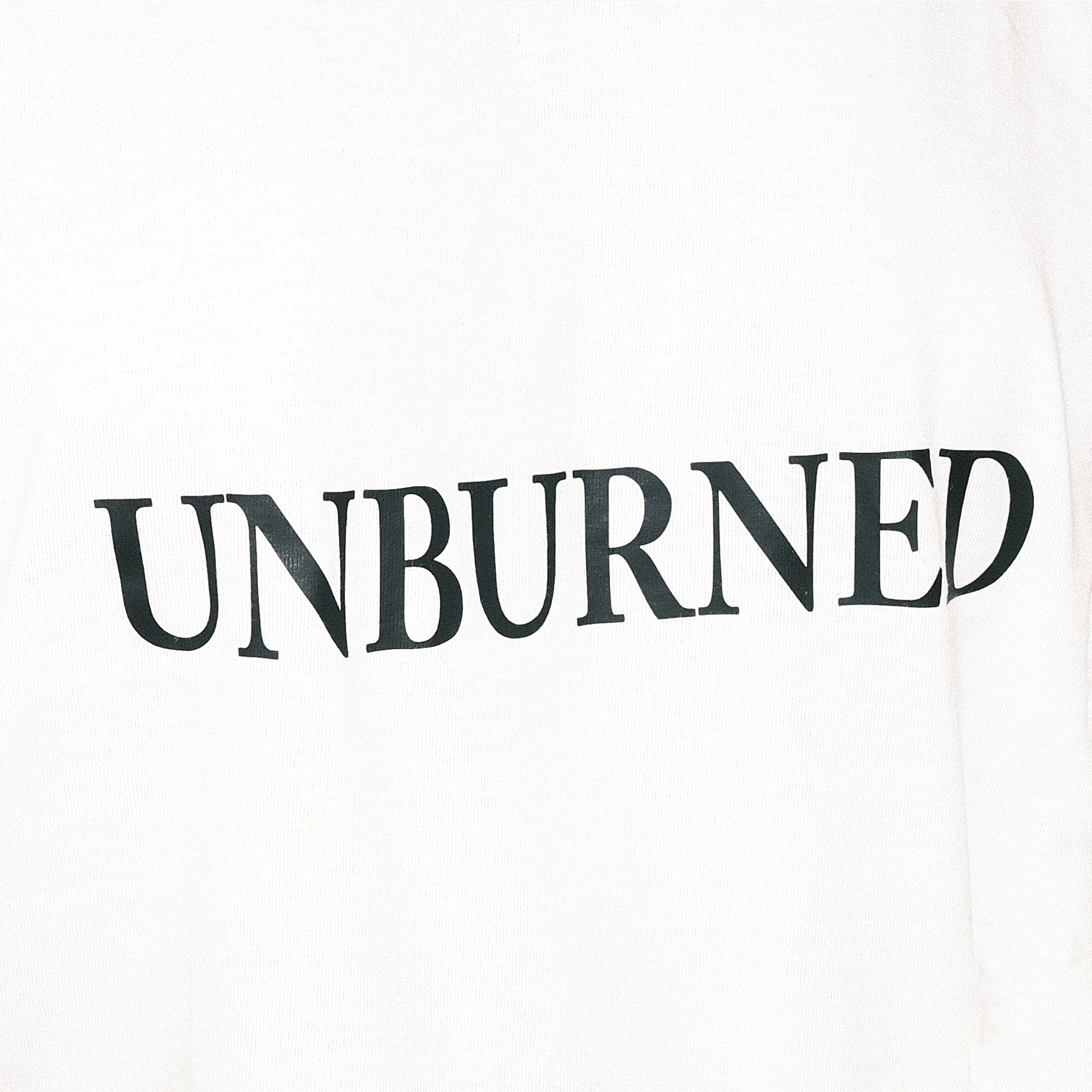 UNBURNED - T-SHIRT